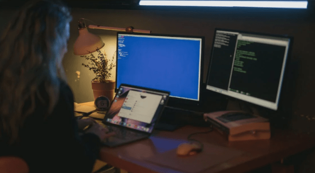 person on tablet and pc